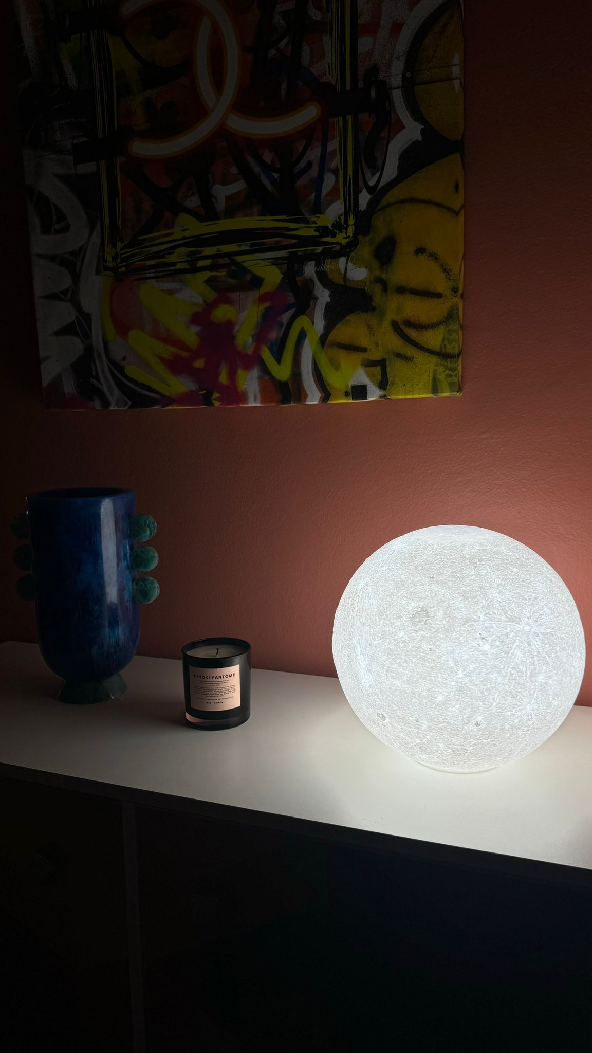 Moon night light illuminating a room with soft, starry glow.